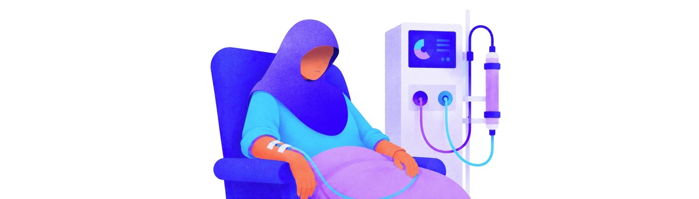 A patient receiving dialysis treatment beside a dialysis machine